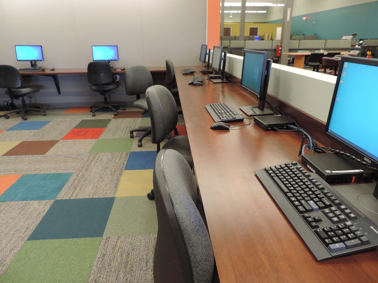 Resource area with computers and a printer/scanner/fax available to the public.