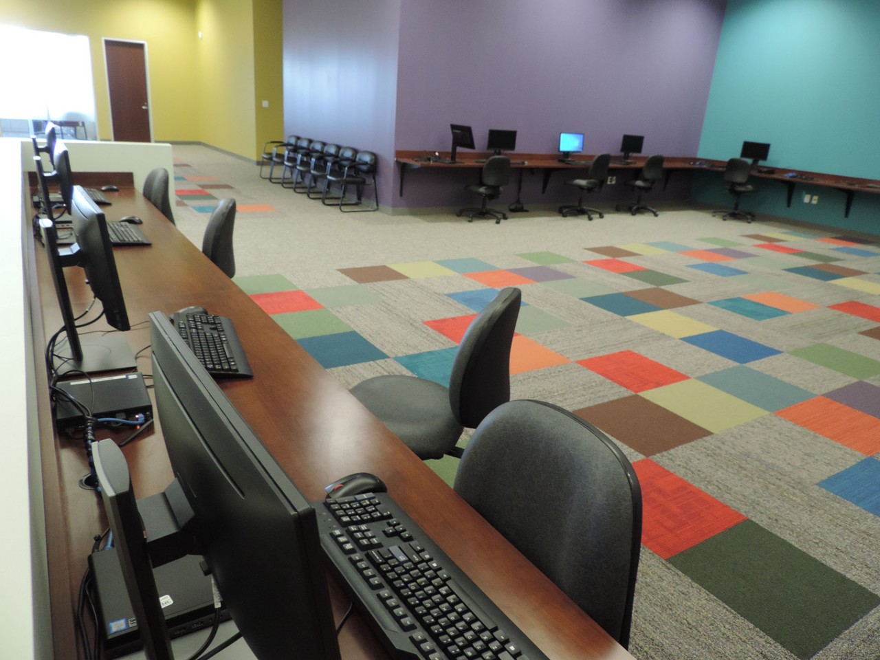 Resource area with computers and a printer/scanner/fax available to the public.