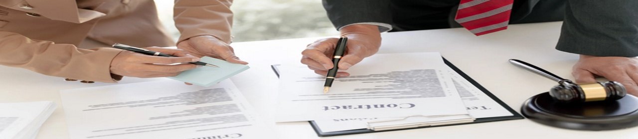 Legal documents on desk with gavel