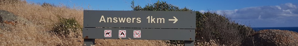 Sign on a hill