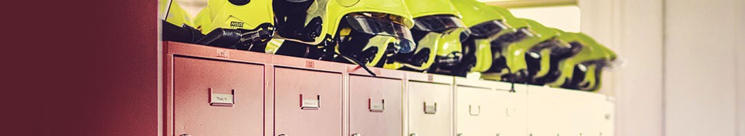 yellow helmets on top of filing cabinets