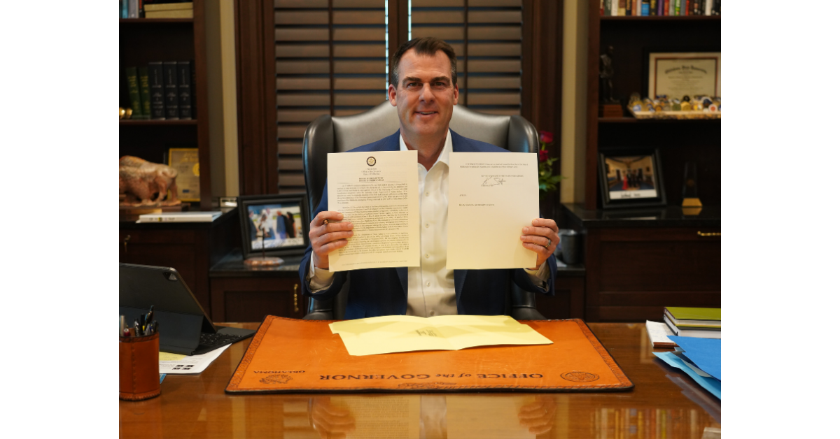 Governor Stitt Holding Signed Executive Order