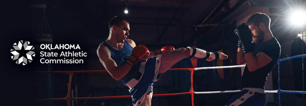 Two kickboxers engage in the ring in this image representing the Oklahoma State Athletic Commission.