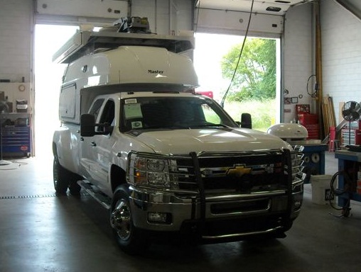 Mobile Communications truck inside garage Mobile Communications truck inside garage