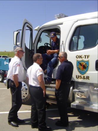 Urban Search Rescue Cab Urban Search Rescue Cab with four men talking