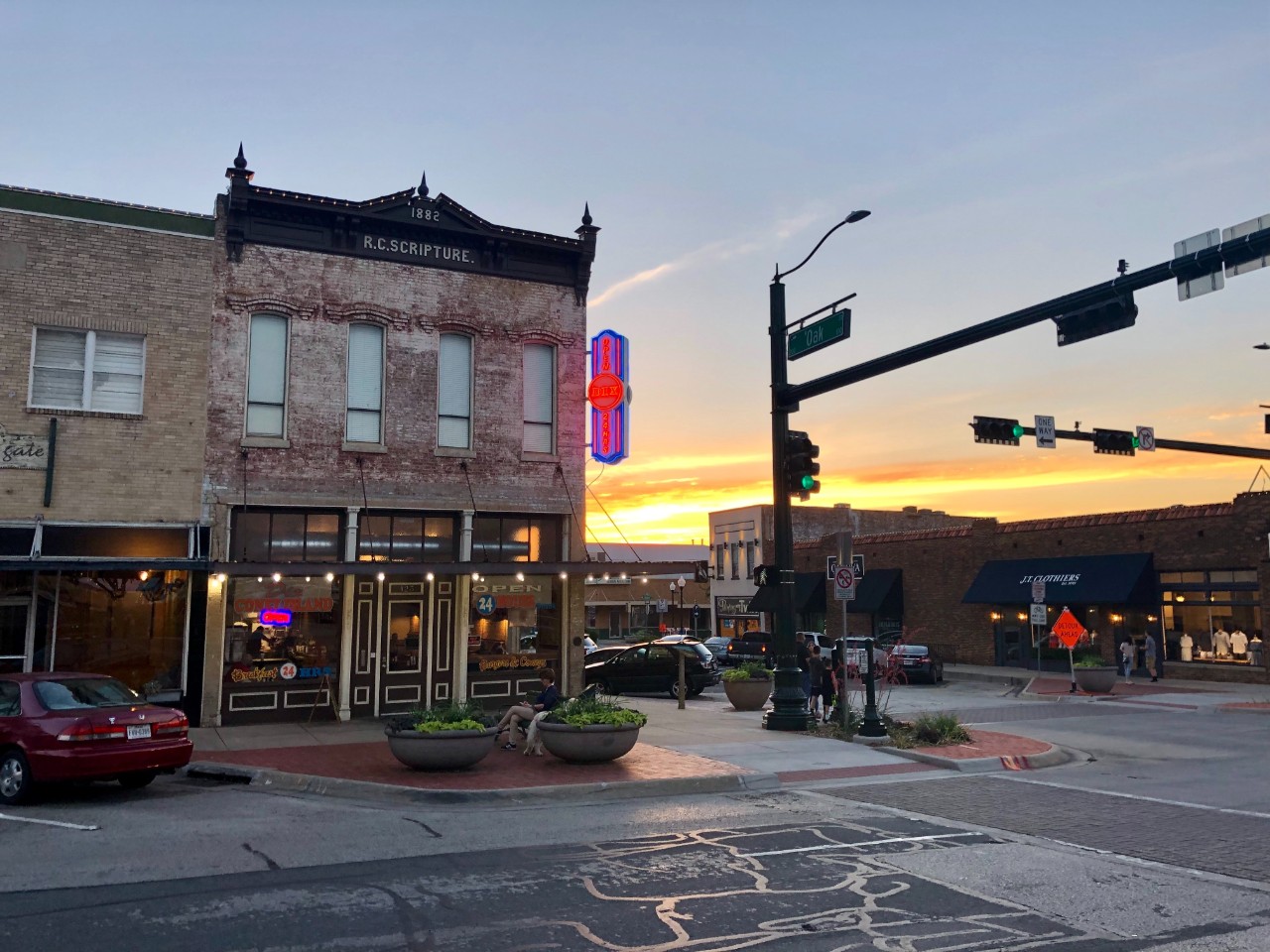 Small town street corner at sunset