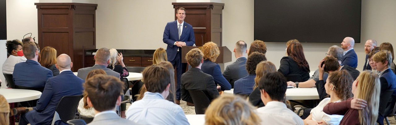 Governor Stitt Listening To A Group