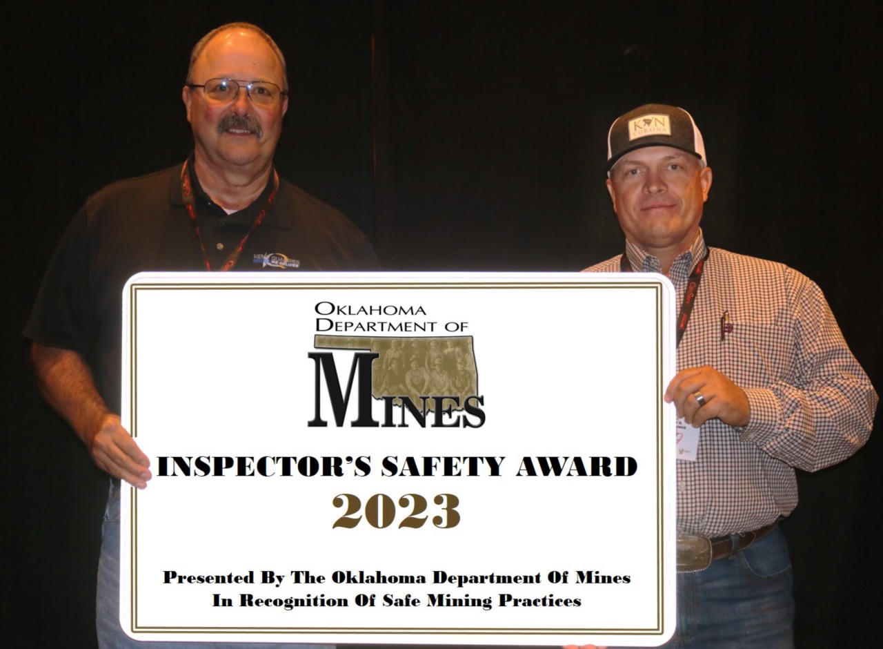 Oklahoma Department of Mines Inspector Bob Butler with Small Mine Safety Award Winner Benton County Stone (Rockin’ E Quarry, Permit Number LE-2359)
