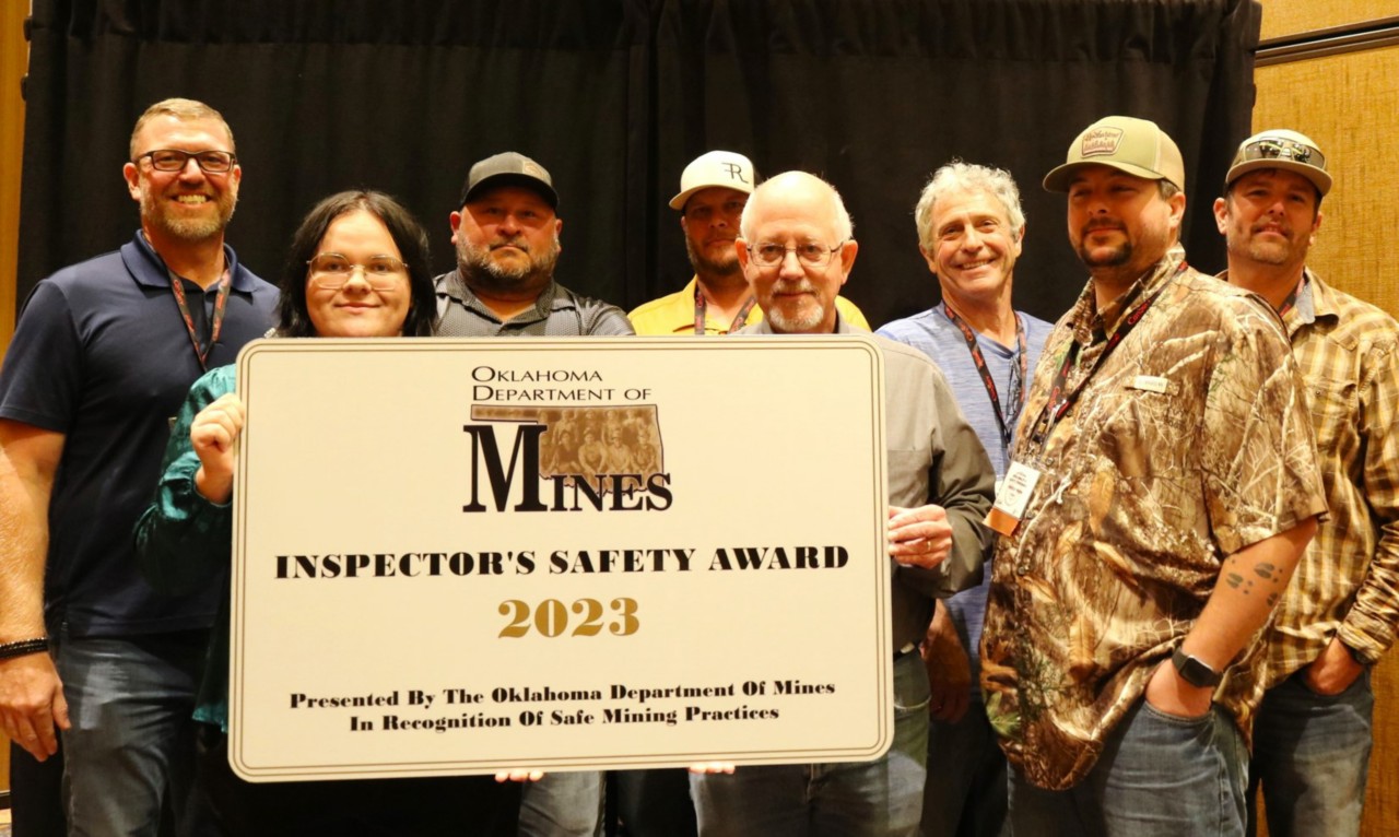 Oklahoma Department of Mines Inspector Brad Montgomery with Large Mine Safety Award Winner Unimin Corp. (Roff Plant, Permit Number LE-1565)