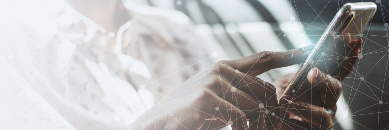 Woman using a phone in a car