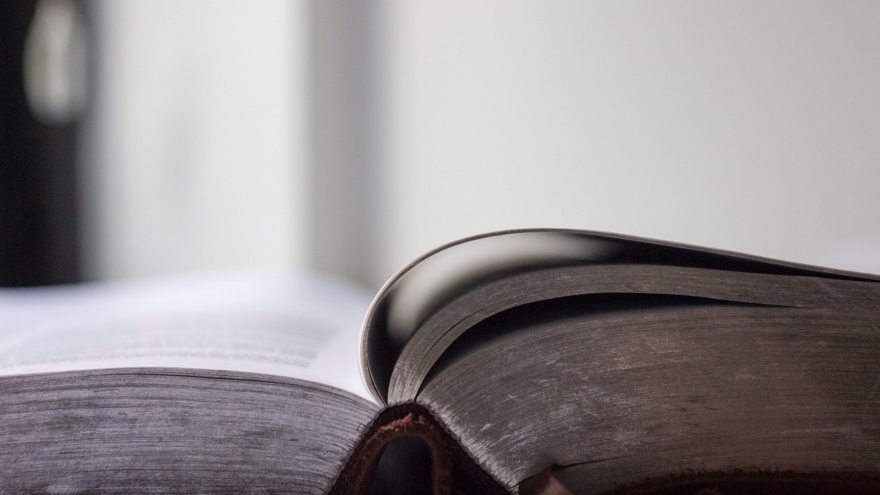 Selective focus photo of an open book