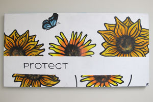 Art project piece with word "Protect"