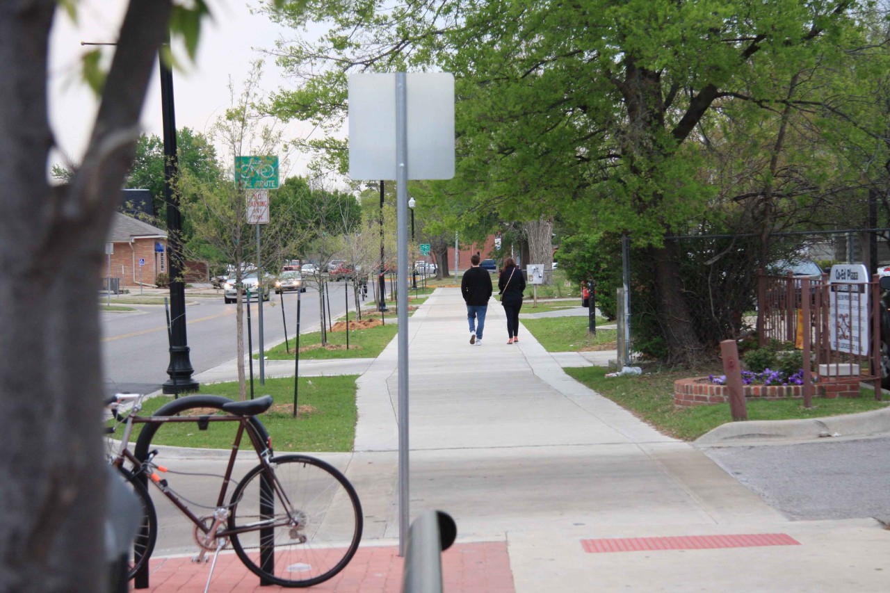 Pedestrians on sidewalk in Norman