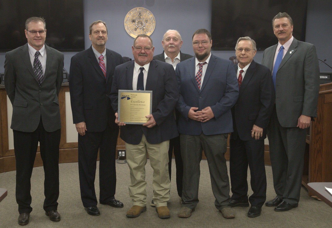 ODOT workers and transportation officials during presentation of American Concrete Pavement Award