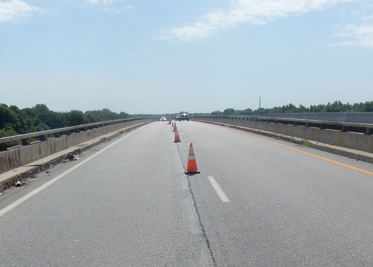 US-412 bridge over Verdigris River, with traffic cones on the roadway