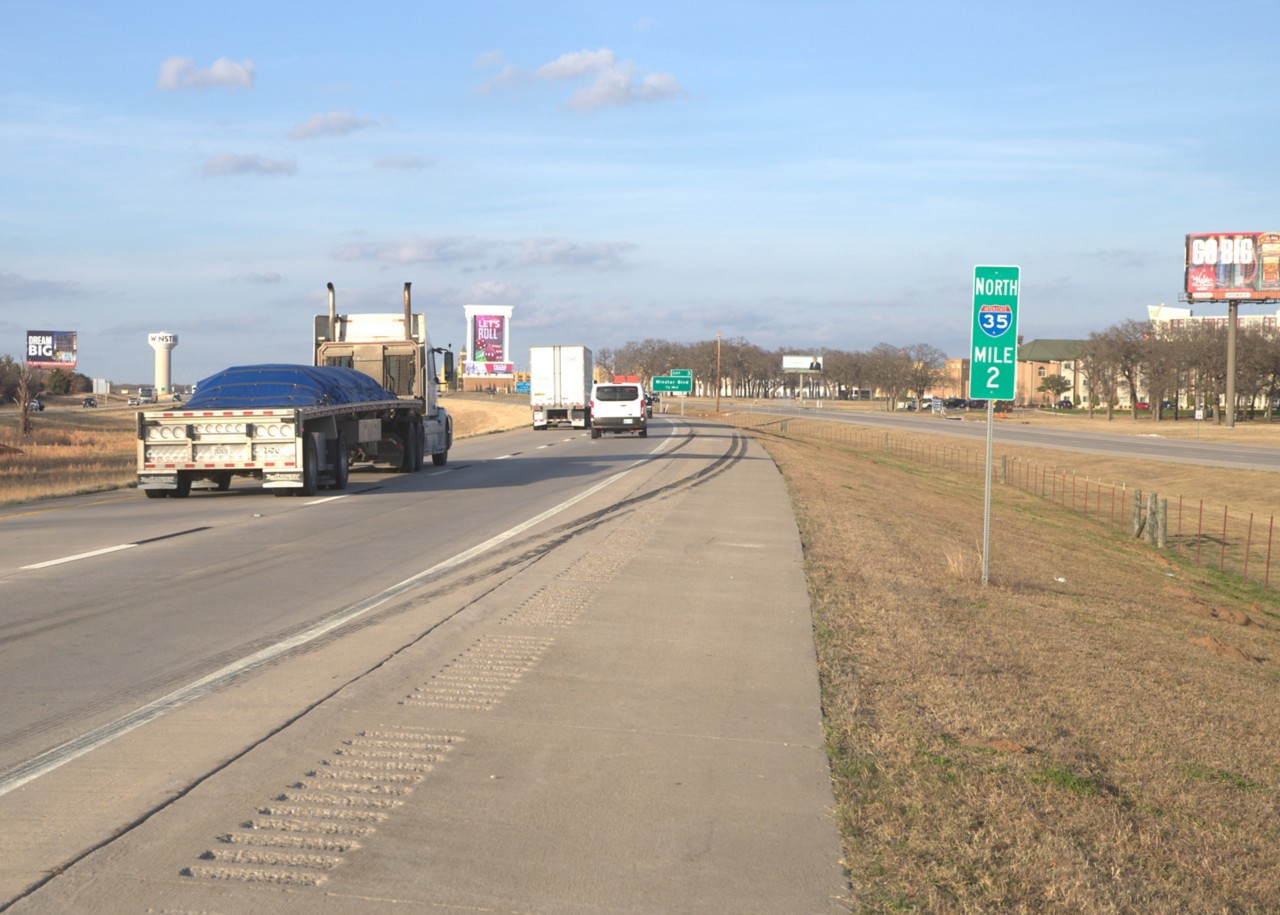 I-35 traffic near Thackerville with cars and trucks on the highway