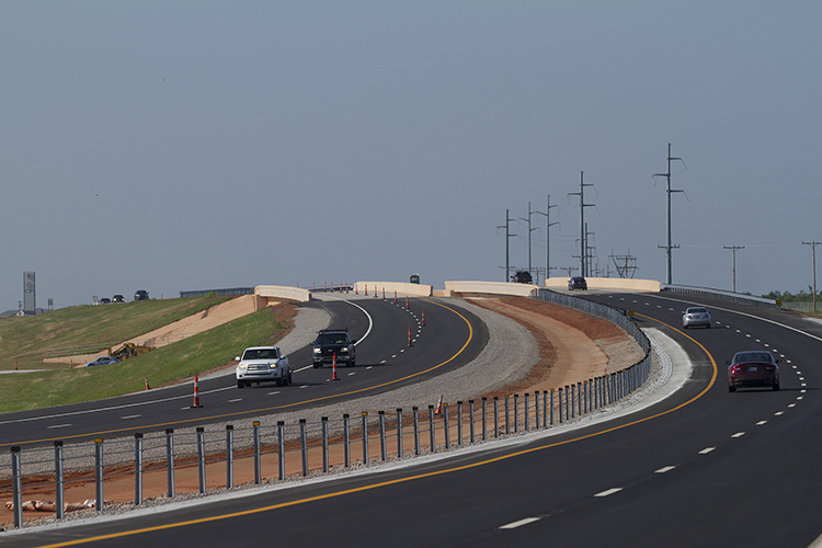 SH-74 four lanes open_web.jpg Memorial Road
