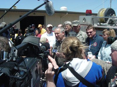 Governor Henry speaking at press conference
