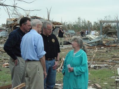 Officials speak with resident whose home was destroyed