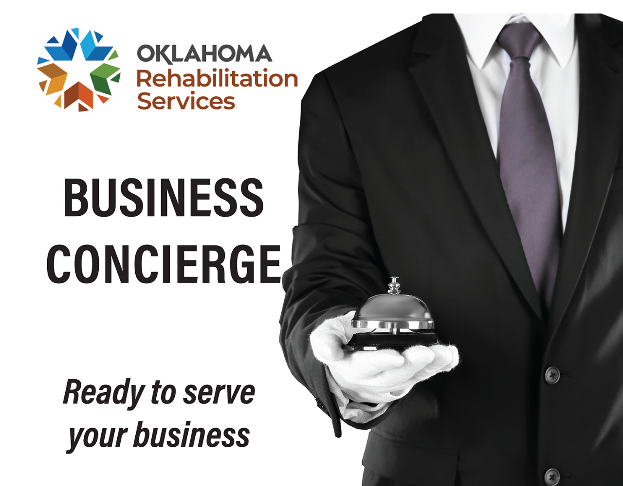 A man in a black suit with white gloves holding out a service bell. Business concierge ready to serve your business