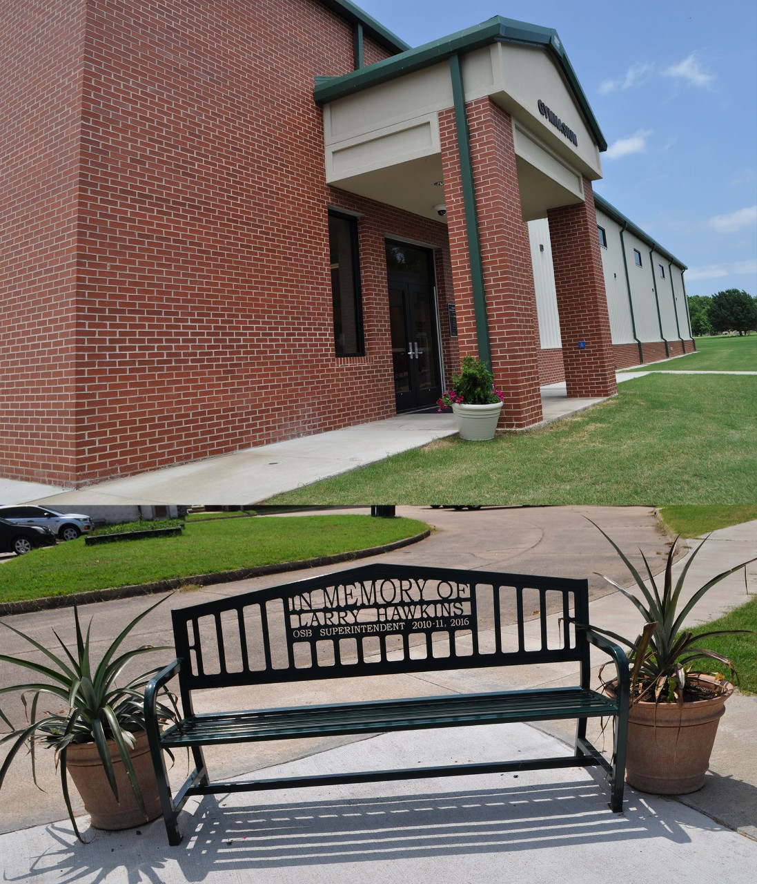Entrance to brick building. Sign on bench: In Memory of Larry Hawkins.