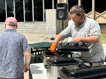 OMES Employee Appreciation Day Staff of Capital Assets Management preparing food during OMES Employee Appreciation Day.