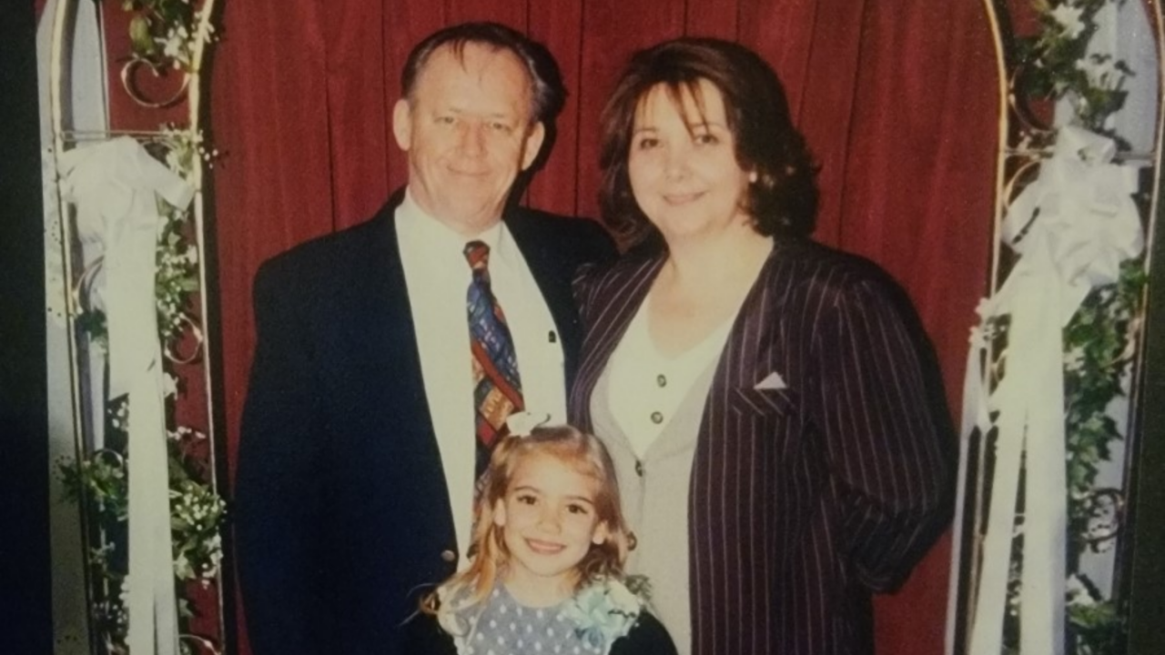 Young Coley-Roberts with her adopted parents.