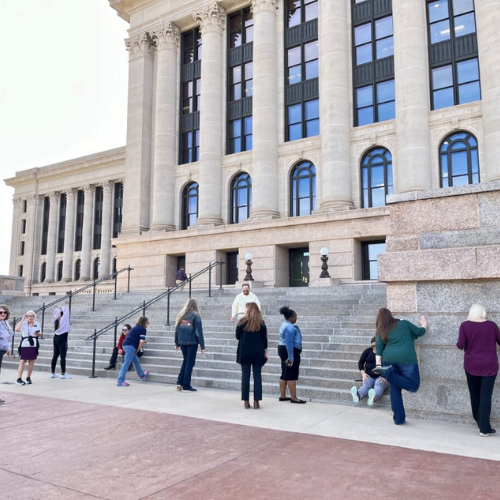 Group stretching post-walk on Capitol steps Group stretching post-walk on Capitol steps