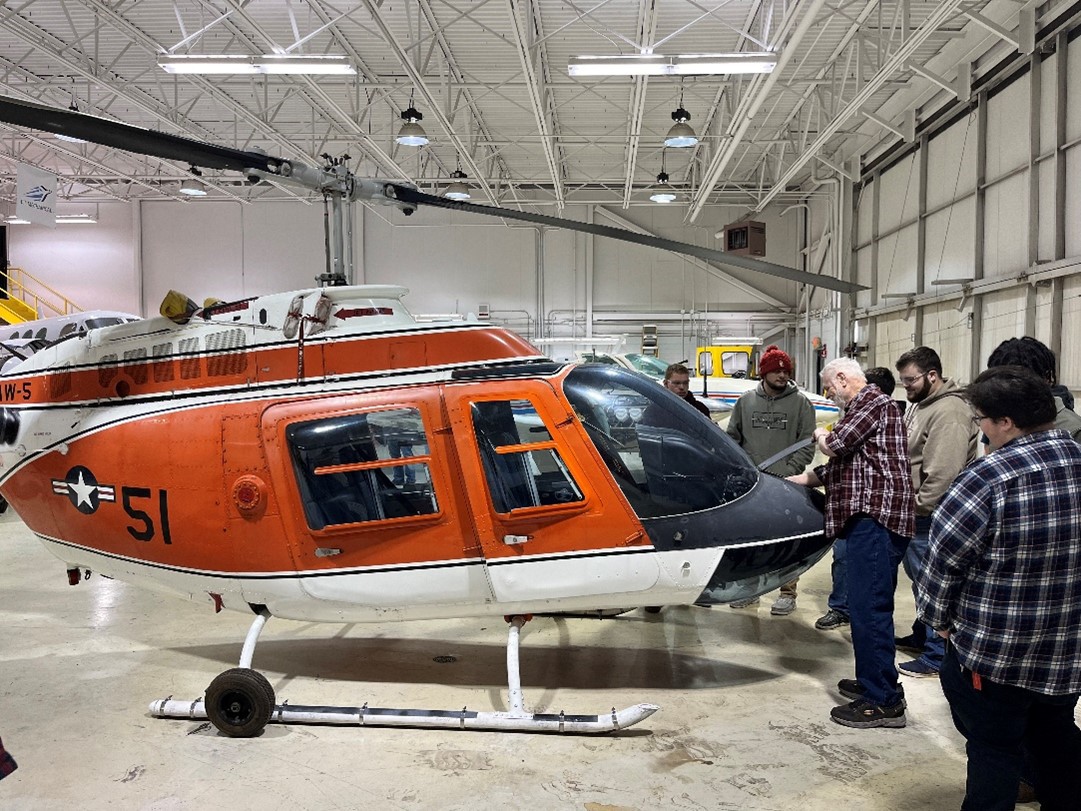 Gordon Cooper Technology Center students and staff observe their newly acquired helicopter.