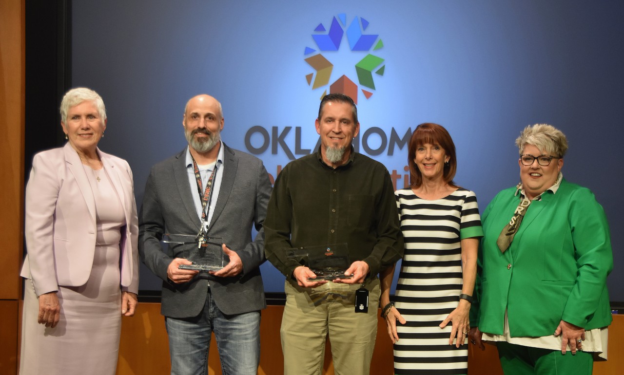 Gathered for the 2024 Agency Partners of the Year awards presentation are, from left, Commissioner Janet C. Barresi,  OMES Capital Assets Management Administrator Nathan Wald, OMES Construction Services and Property Claims Manager Darren Garvin, Commissioner Theresa Flannery, and DRS Director Melinda Fruendt.