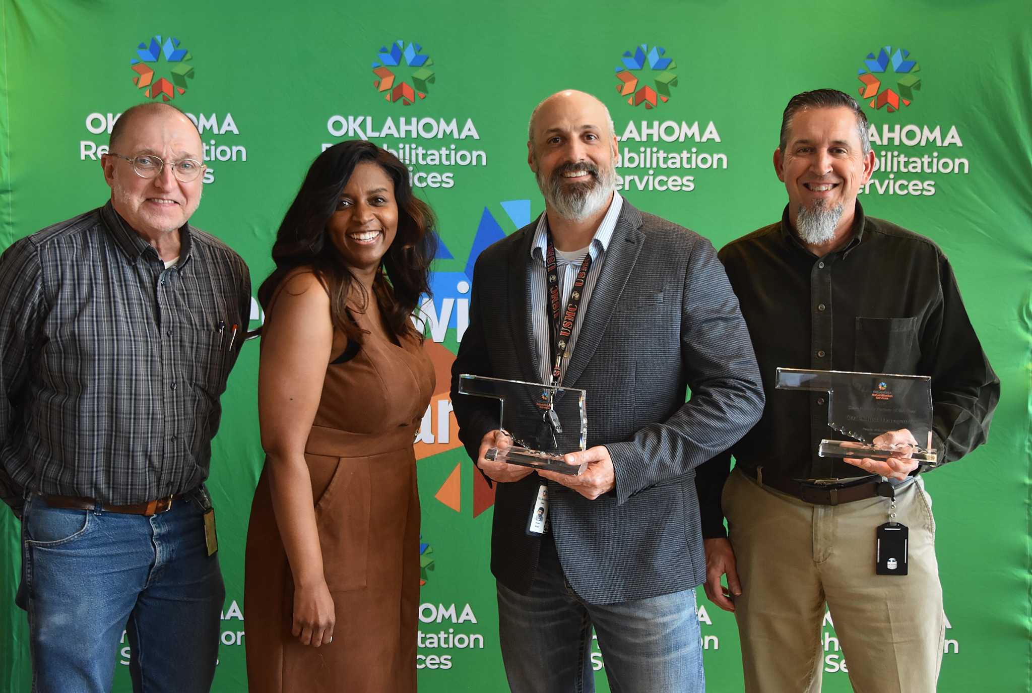 From left, OMES Senior Construction Project Manager Daniel Linehan, OMES Deputy General Counsel Mary Jackson, Nathan Wald and Darren Garvin.