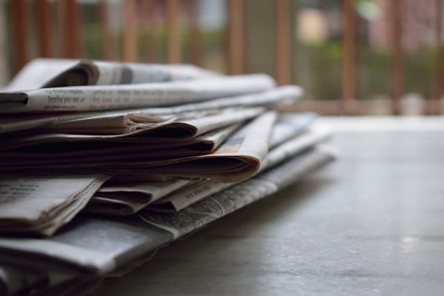 Decorative image of newspapers