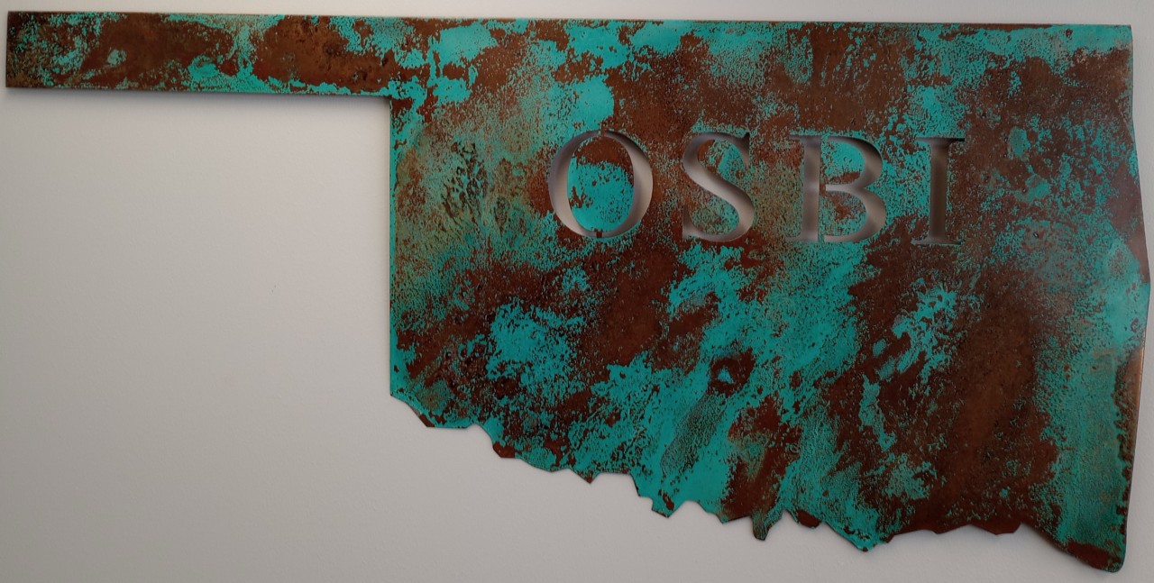 osbi brass wall hanging