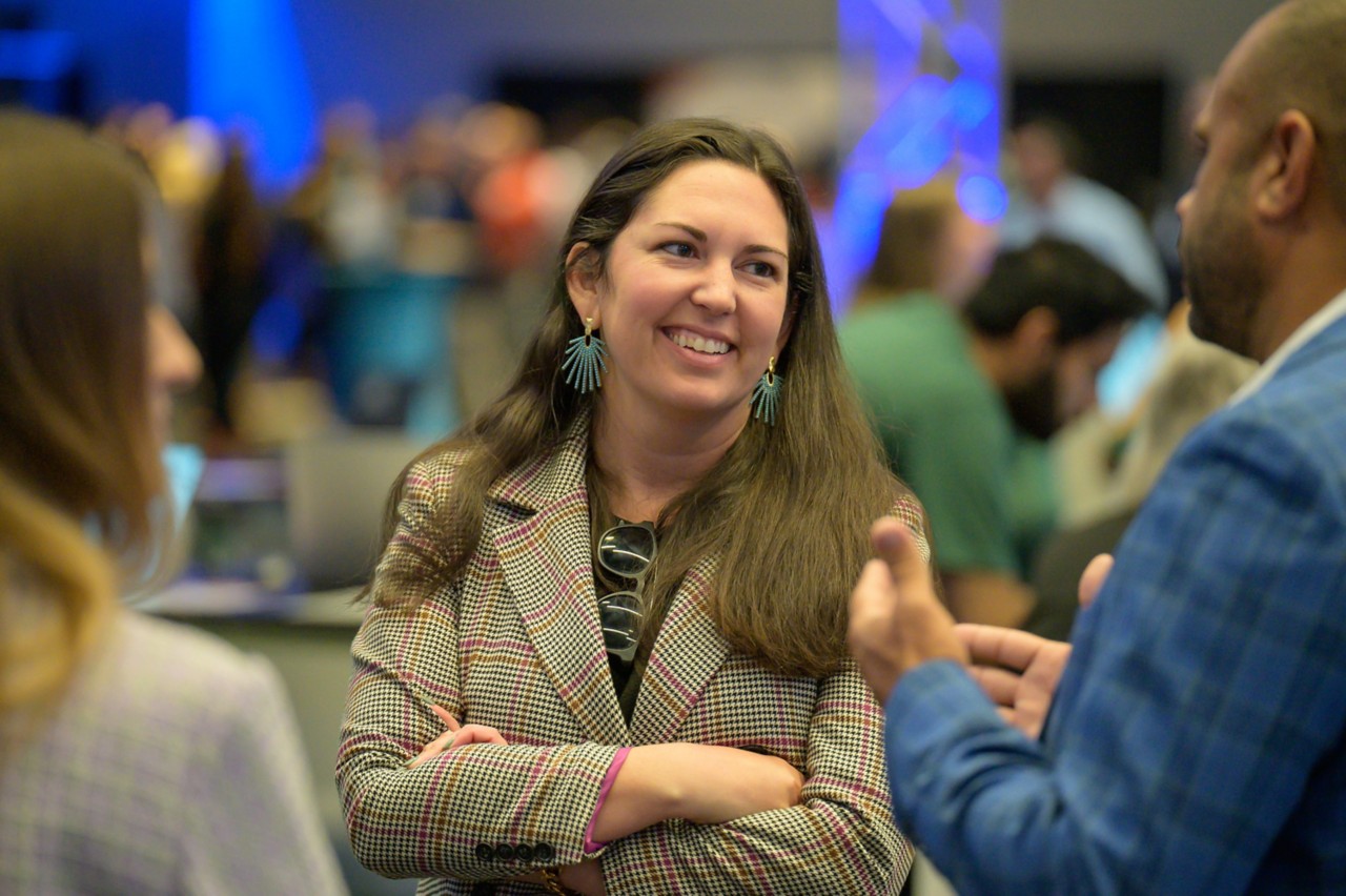 Attendee Smiling and talking to State CIO Joe McIntosh