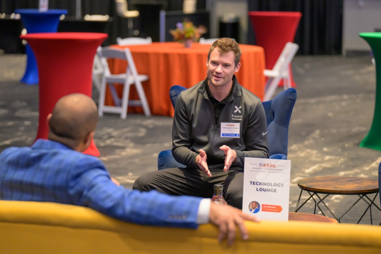 An attendee talks with Joe McIntosh during the Business Matchup at the 2024 State Suppliers Expo.