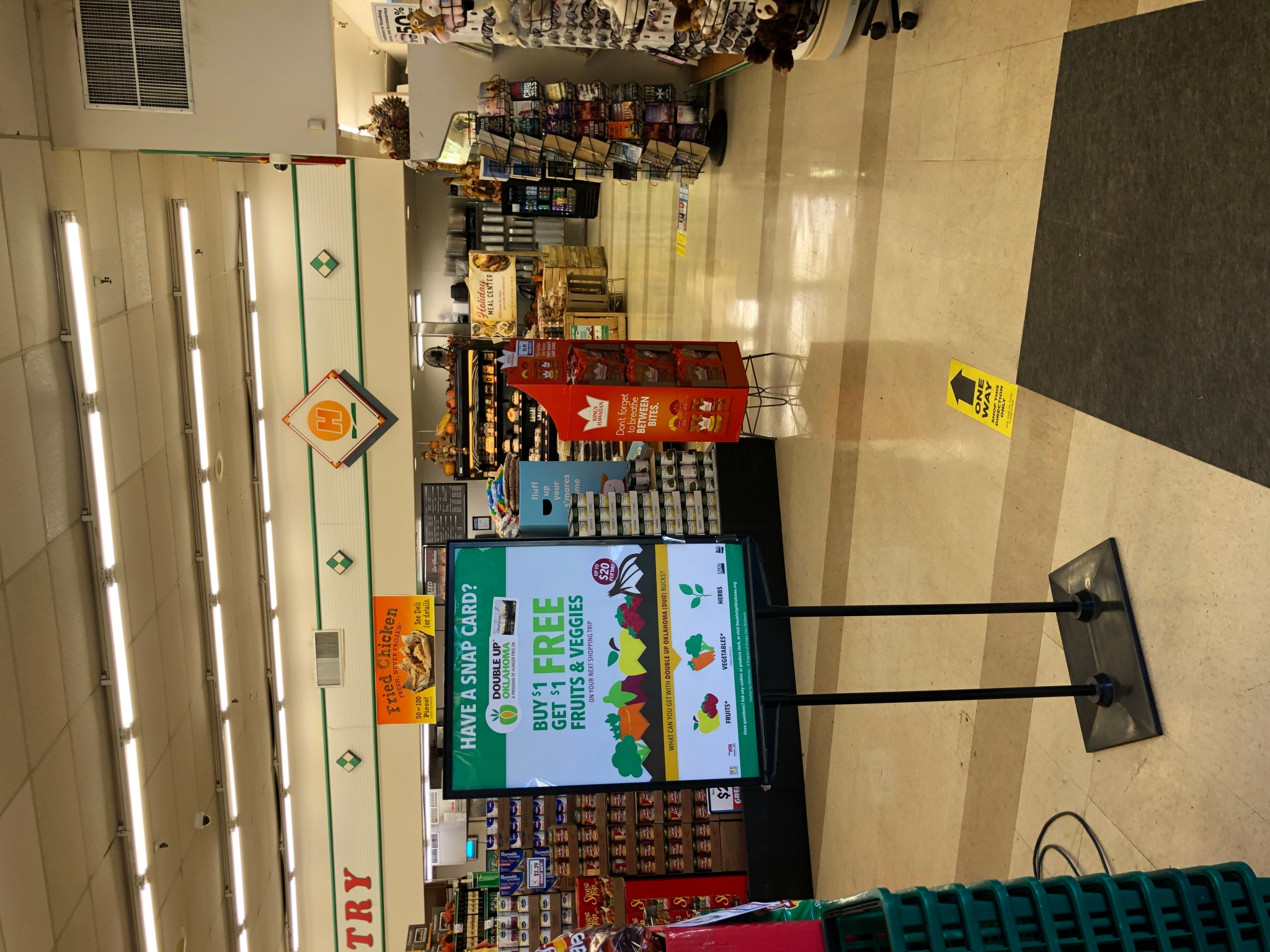 Signage for Snap Card in grocery store to get free fruits and vegetables.